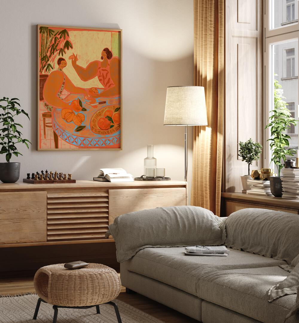 The Mandarin By Arty Guava Wall Art Prints in Oak Wood Plain Frame placed on a Cream Colored Wall near a Green Sofa  in the Living Room