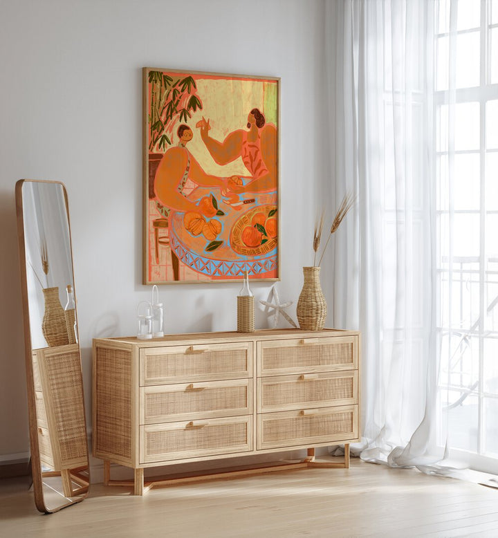 The Mandarin By Arty Guava Wall Art Prints in Oak Wood Plain Frame placed on a Cream Colored Wall above a Console Table in the Drawing Room 