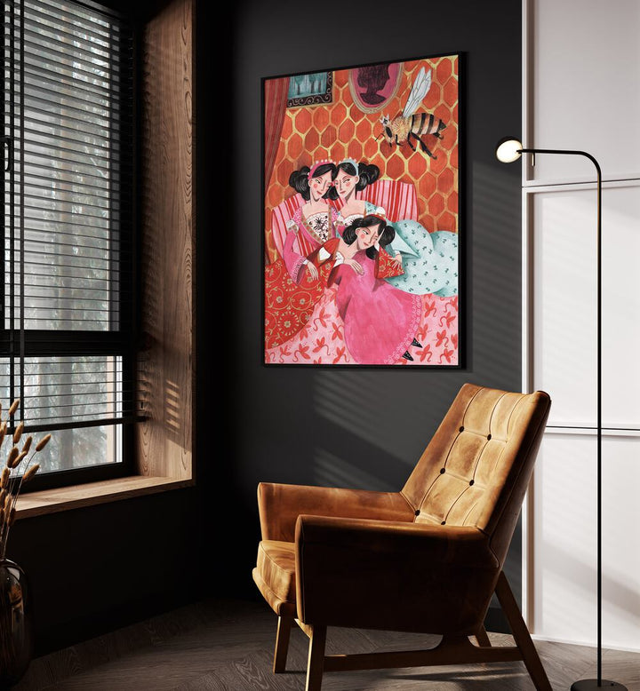 The Queen Bee and Pink Princesses By Caroline Bonne Muller Women Paintings in Black Plain Frame on a black wall beside an orange sofa