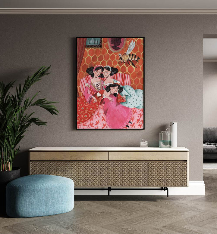 The Queen Bee and Pink Princesses By Caroline Bonne Muller Women Paintings in Black Plain Frame on a wall above a console table beside a plant