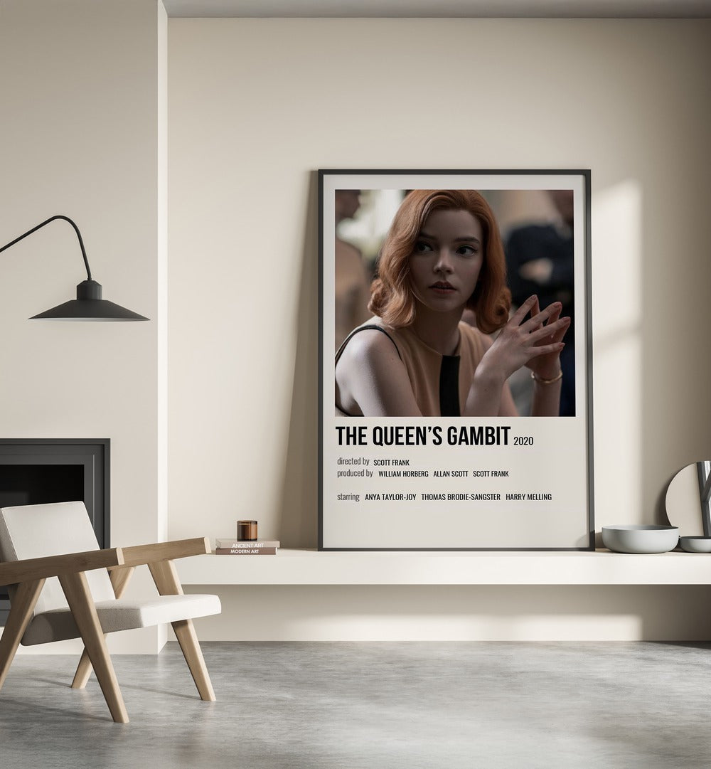 The Queens Gambit 2020 I Movie Posters in Black Plain Frame placed on a shelf beside a hearth