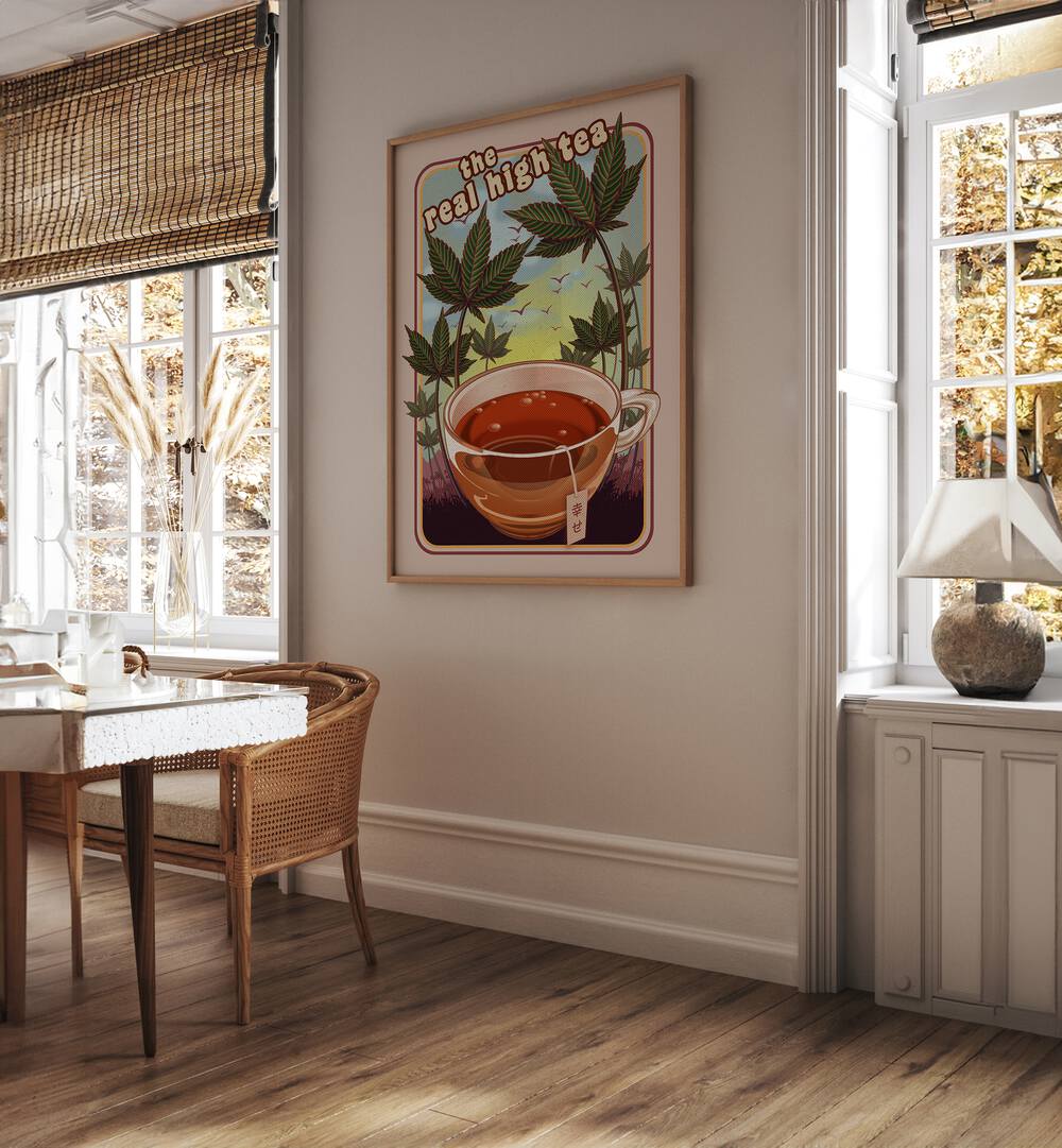 The Real High Tea Cafe Art Prints Cafe Posters in Oak Wood Plain Frame placed on a White Colored Wall near a Dining Table in the Dining Room