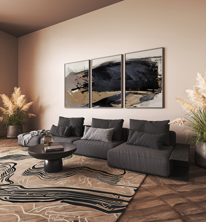 The Snap Abstraction Set Set Of 3 Paintings in Black Plain Frame placed on a wall behind a black sofa for living room