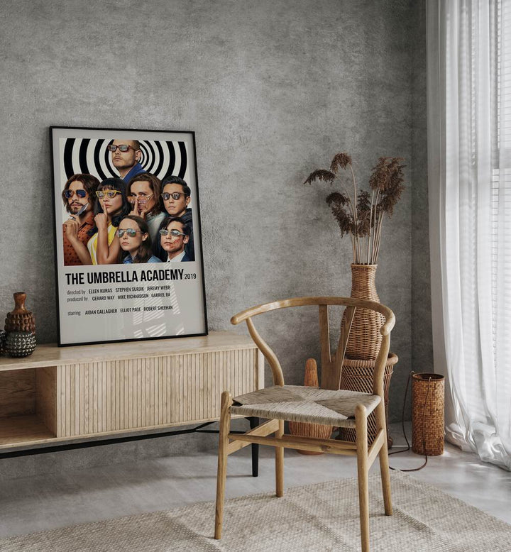 The Umbrella Academy 2019 Movie Posters in Black Plain Frame placed on a console behind a chair