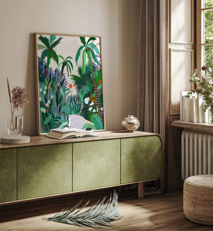 The Urban Jungle Route By Uma Gokhale Botanical Art Prints in Oak Wood Plain Frame on a green console table beside a window