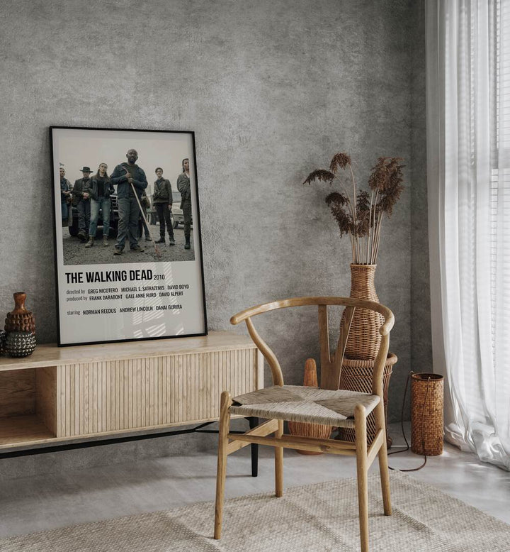 The Walking Dead 2010 II Movie Posters in Black Plain Frame placed on a console behind a chair