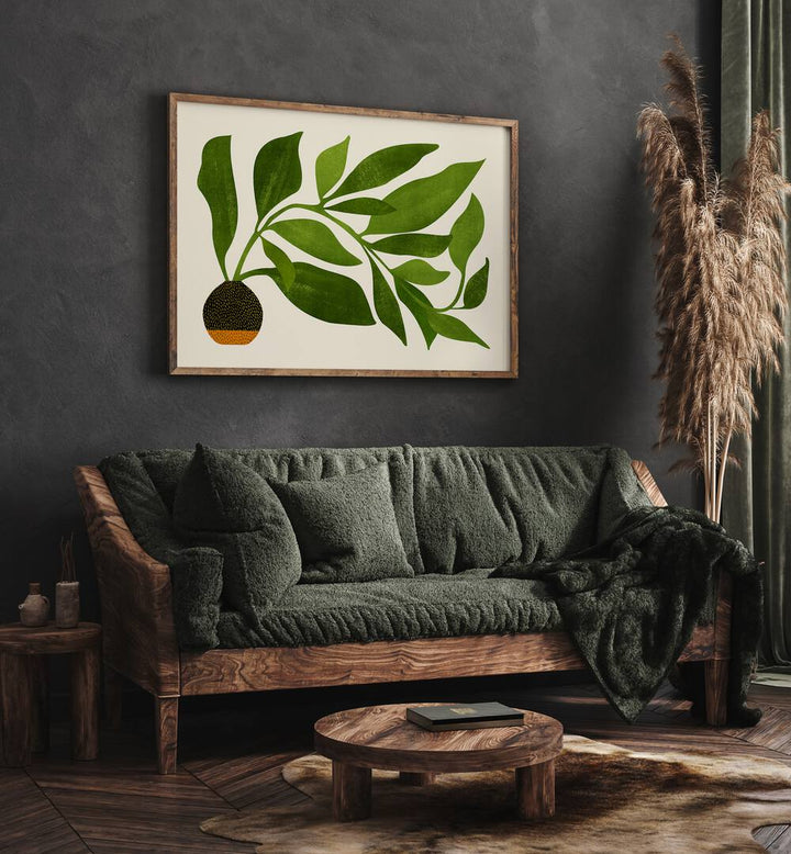 The Wanderer by Kristian Gallagher Botanical Flower Paintings Floral Paintings in Oak Wood Plain Frame placed on a wall behind a sofa and beside a plant