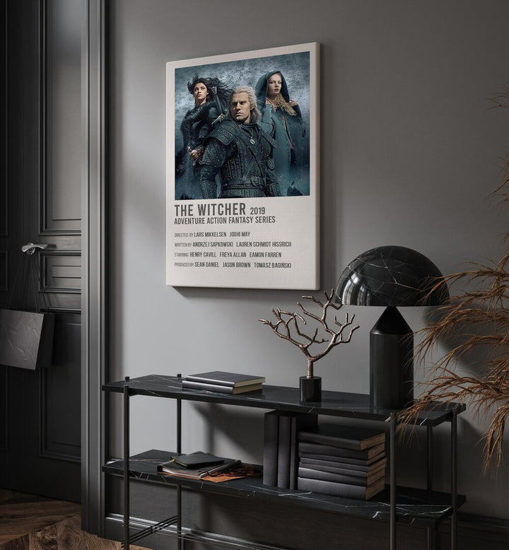 The Witcher 2019 Movie Posters in Gallery Wrap placed on a wall behind a table and beside a door