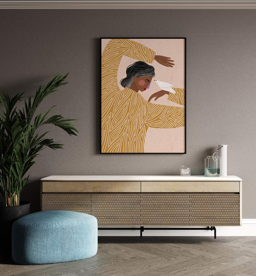 The Woman With Her Bird By Bea Muller Women Illustration Paintings in Black Plain Frame on a wall above a console table beside a plant