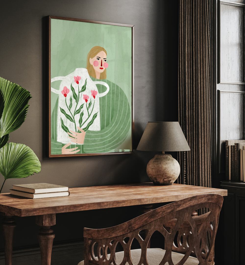 The Woman With Her Vase By Bea Muller Women Illustration Paintings in Dark Wood Plain Frame on a wall above a study table beside a plant