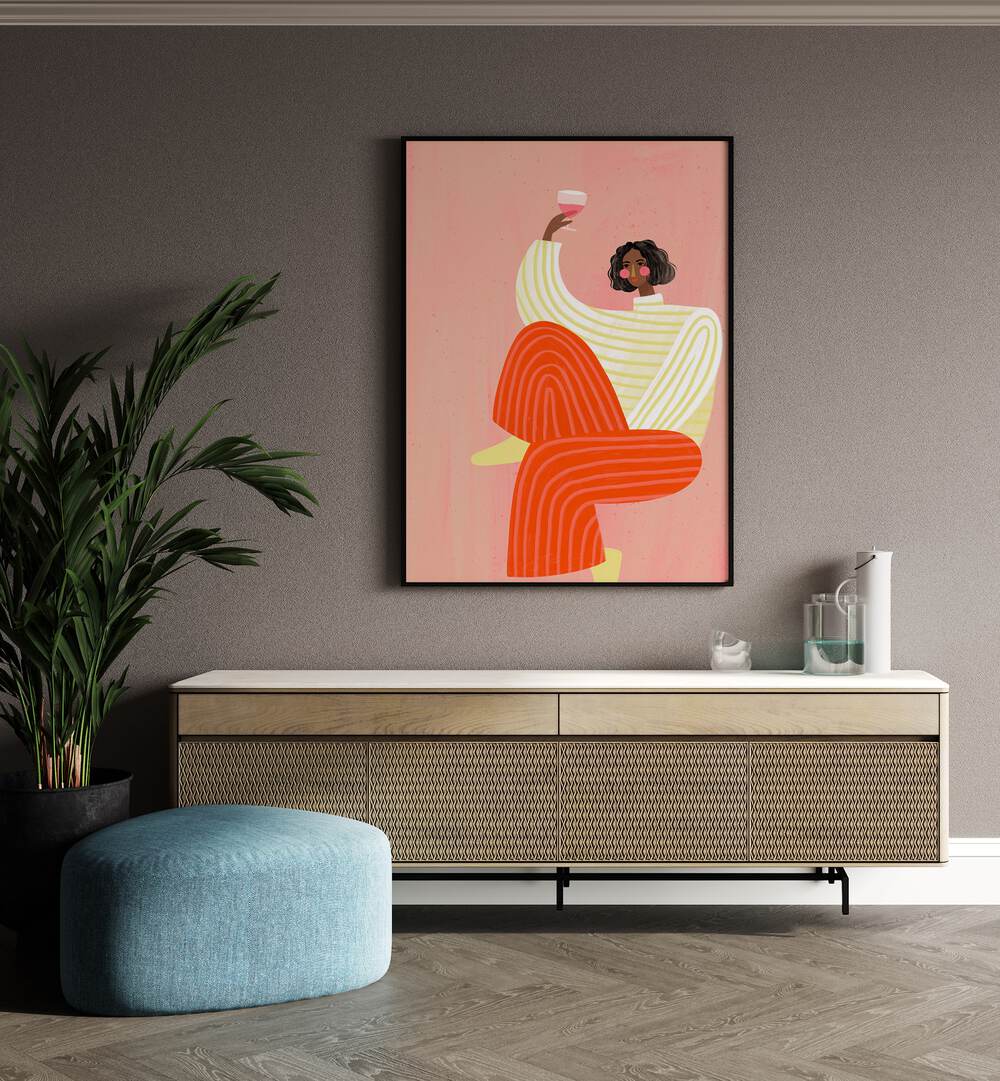 The Woman With The Glass Of Wine By Bea Muller Women Illustration Paintings in Black Plain Frame on a wall above a console table beside a plant