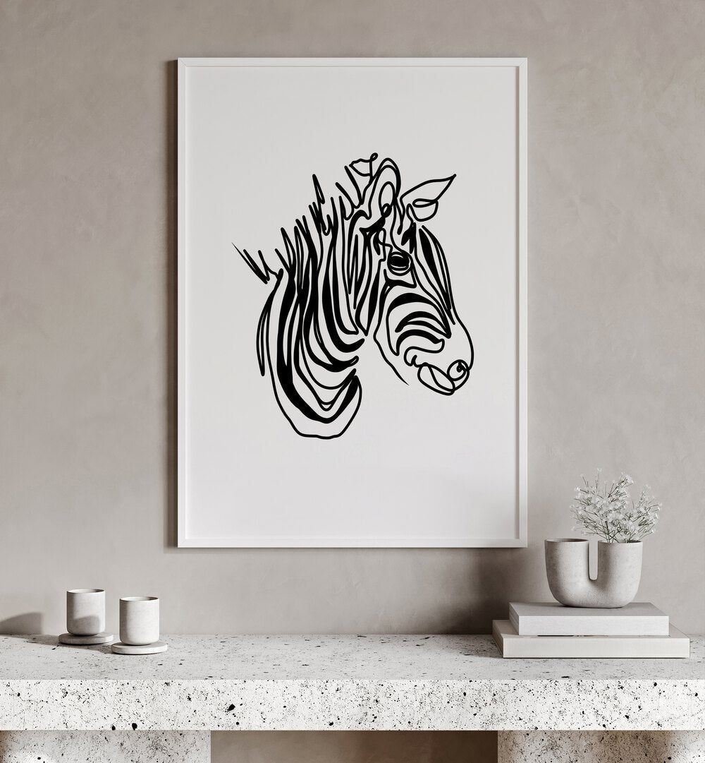 The Zebra by Hanna Lee Tidd Line Art Paintings Line Art Prints in White Plain Frame placed on a wall behind a table