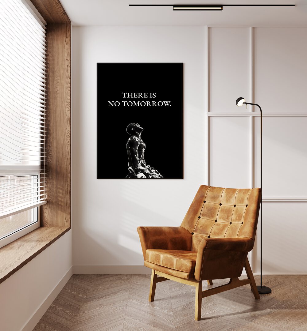 There Is No Tomorrow Quotes And Typography Posters in Black Plain Frame placed on a Cream Colored Wall near a Brown Sofa Chair in the Drawing Room