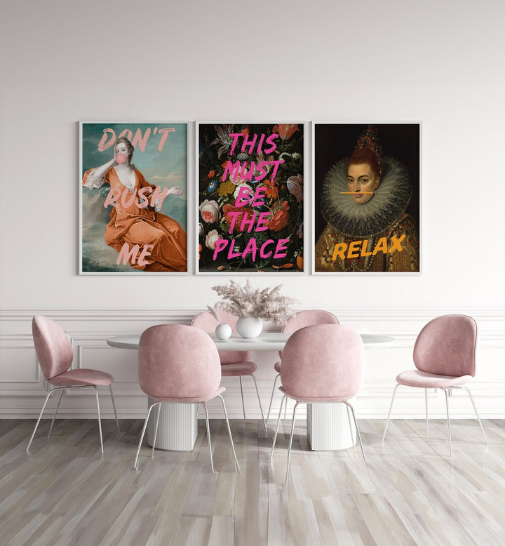 This Must Be The Place Set Set Of 3 Paintings in White Plain Frame placed on a white wall behind a dining table for dining area