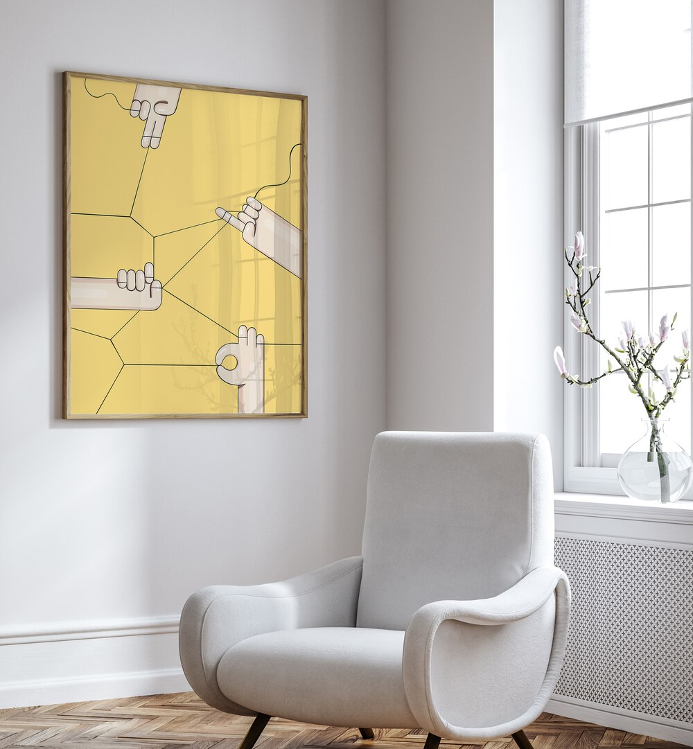 Threads By Samridhi Sharma Gaming Posters in Oak Wood Plain Frame placed on a White Colored Wall near a White Sofa Chair in the Drawing Room