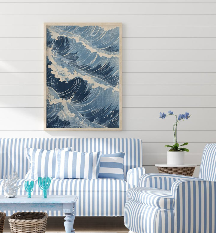 Tidal Waves V Beach Prints Coastal Wall Art in Oak Wood Plain Frame placed on a White Colored Wall near a Blue & White Striped Sofa in the Living Room