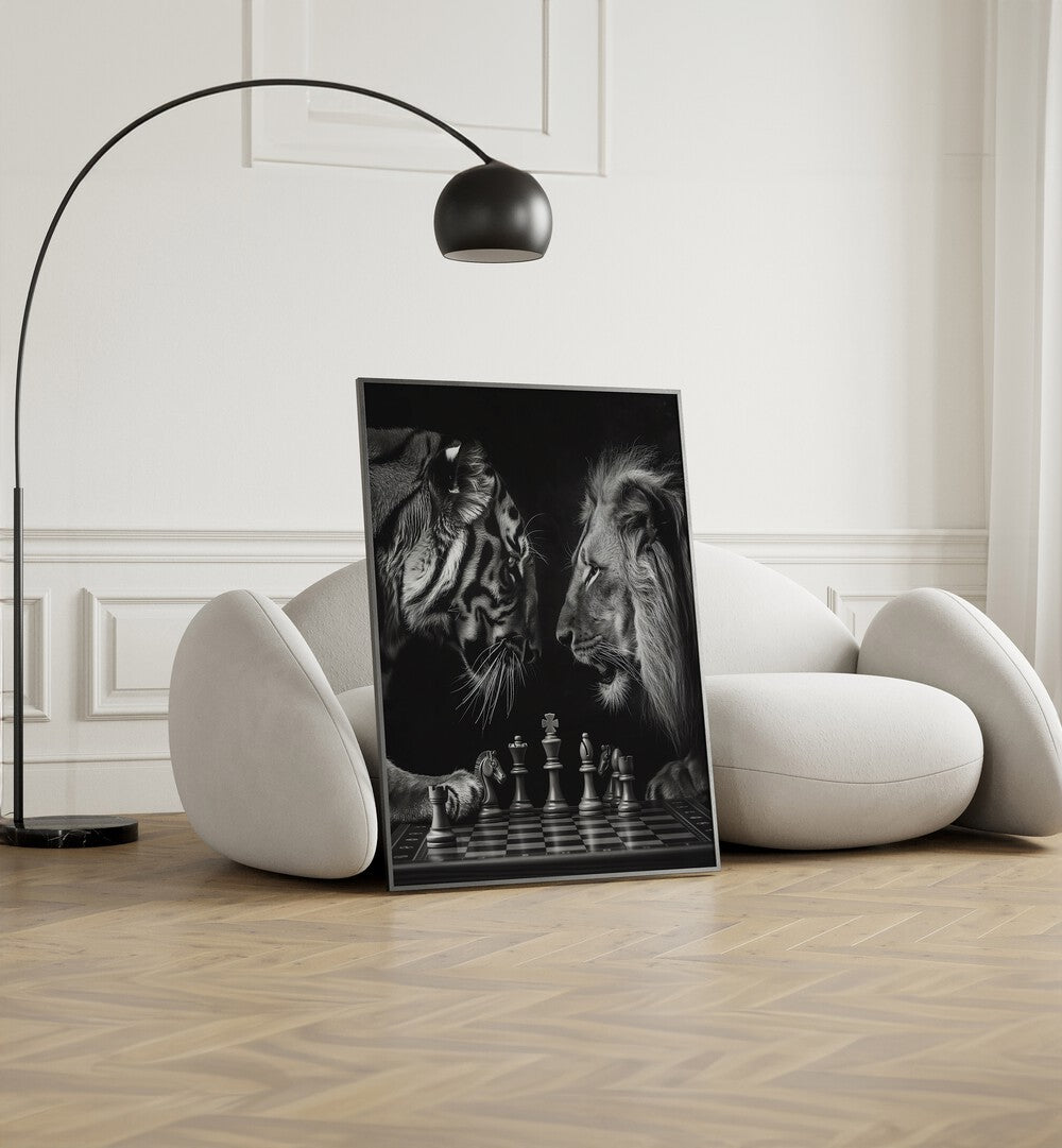 Tiger And Lion Playing Chess Wildlife Posters in Black Plain Frame placed on the floor near a White Sofa in the Living Room