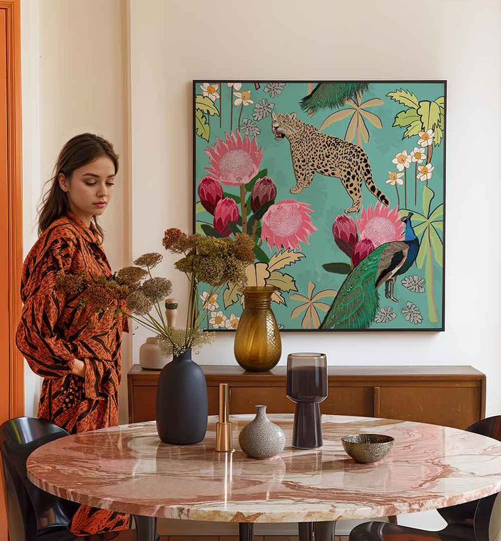 Framed TIGER AND PEACOCK , ANIMAL PAINTINGS artwork showing a peacock and spotted big cat amid tropical florals in a modern dining room