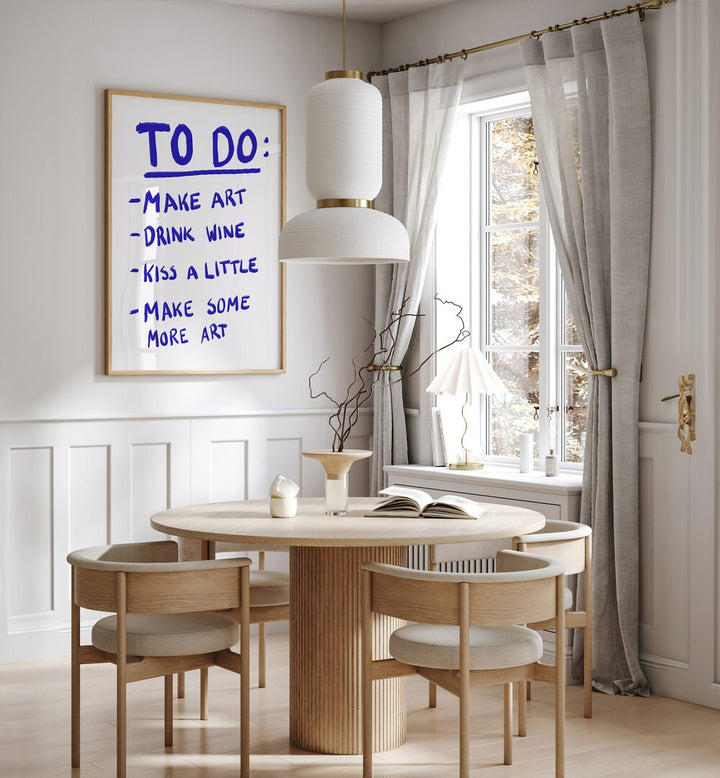 To Do List by Athene Fritsch Quotes and Typography Posters in Oak Wood Plain Frame placed on a wall in a dining room area beside a window and behind a dining table