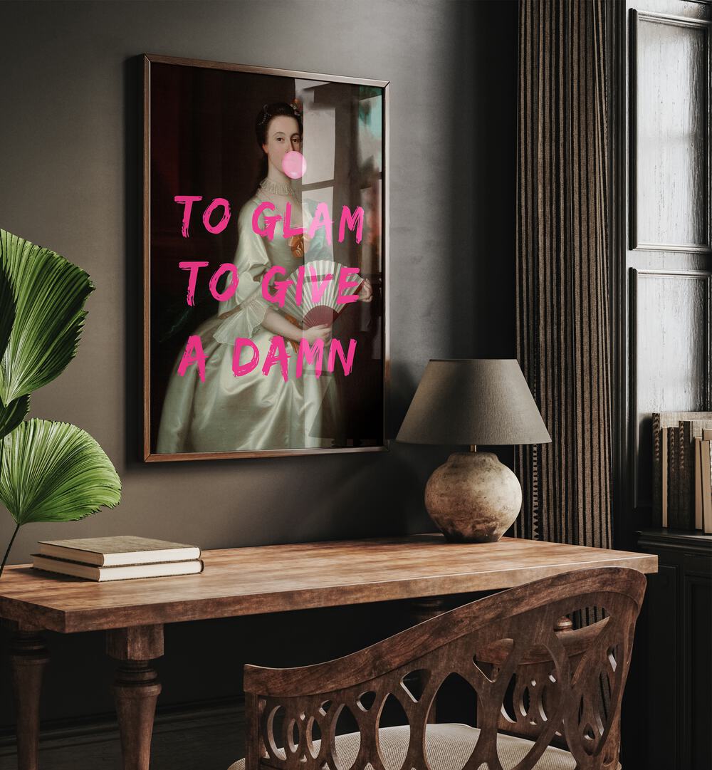 To Glam by the Art Concept Altered Art Prints in Dark Wood Plain Frame placed on a wall behind a study table