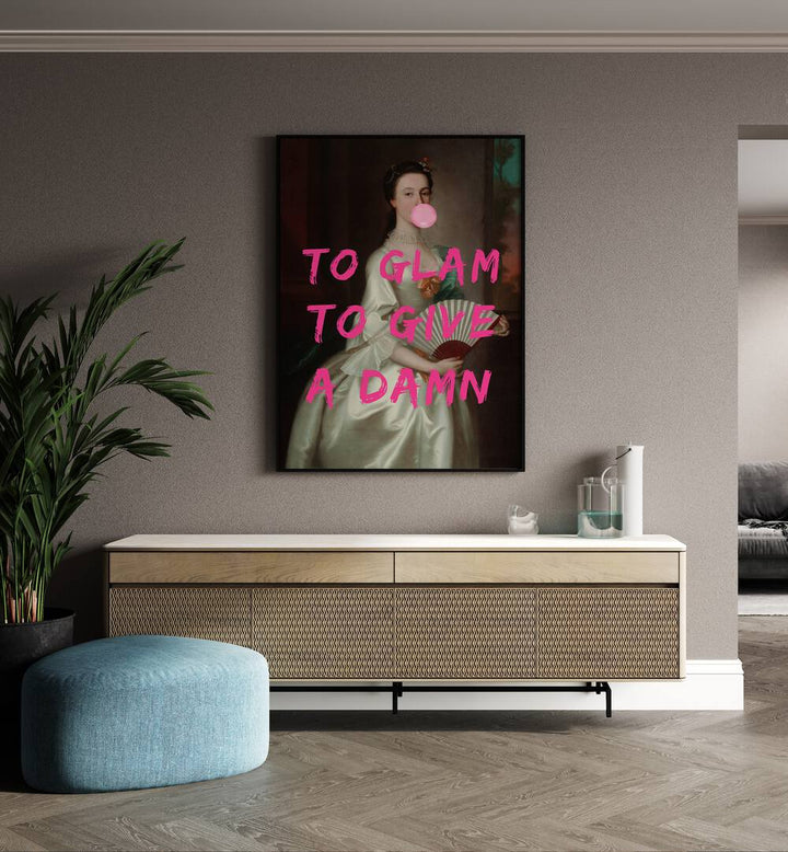 To Glam by the Art Concept Altered Art Prints in Black Plain Frame placed on a wall behind a console table