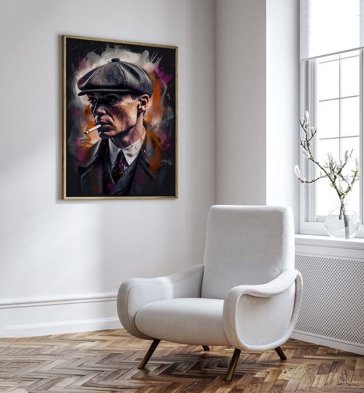 Tommy Shelby Art Movie Posters in Oak Wood Plain Frame placed on a White Colored Wall near a White Sofa Chair in the Drawing Room