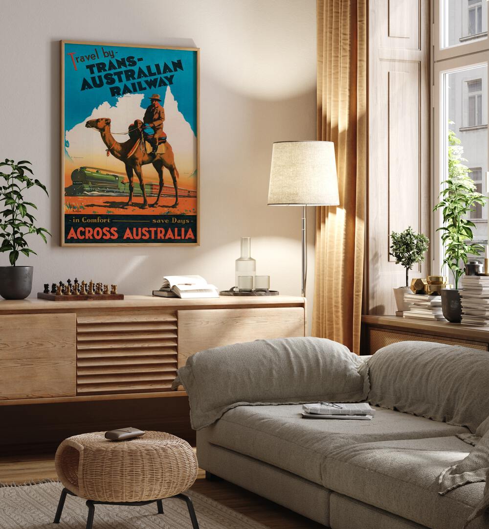 Trans Australian Railway  Retro Travel Posters in Oak Wood Plain Frame placed on a wall behind a console table