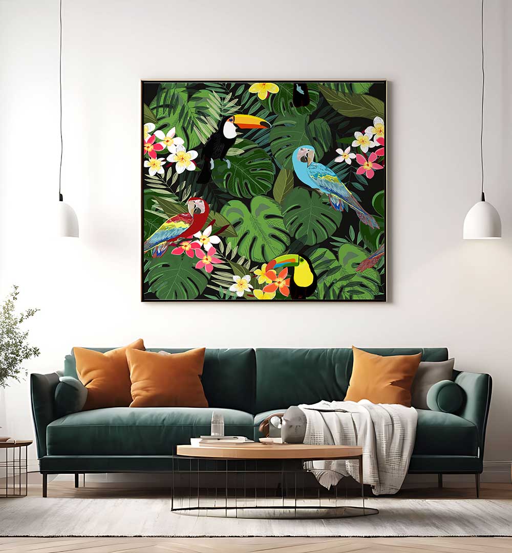 TROPICAL FOREST BLACK , ANIMAL PAINTINGS framed tropical foliage with colorful toucans and parrots above green sofa