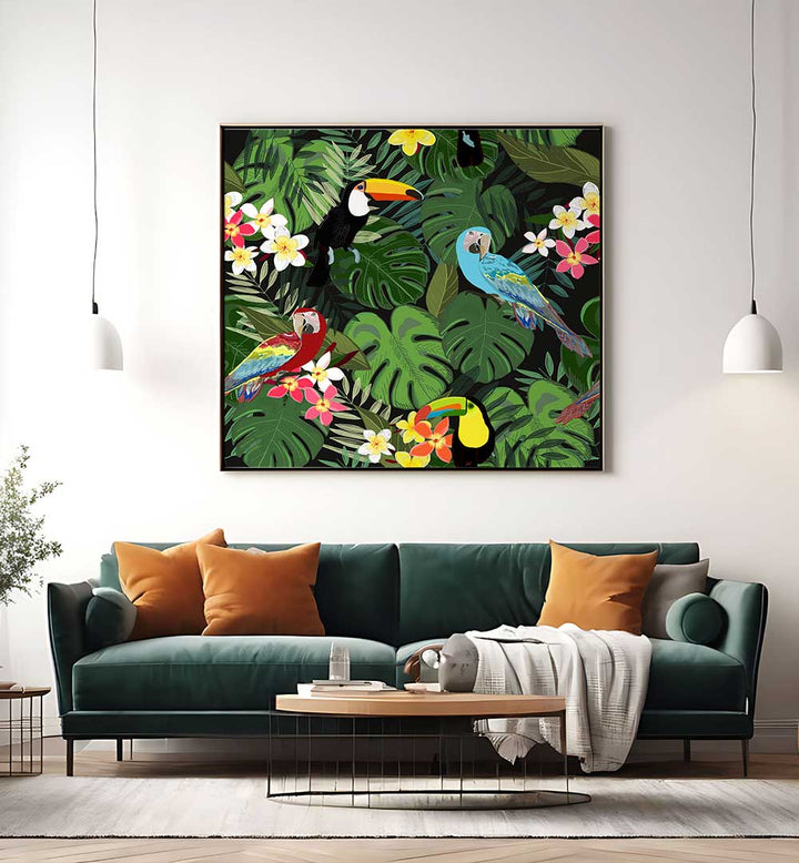 TROPICAL FOREST BLACK , ANIMAL PAINTINGS framed tropical foliage with colorful toucans and parrots above green sofa
