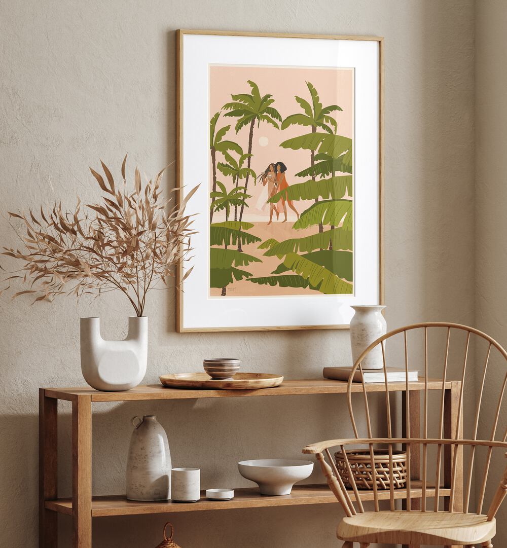 Tropical Paradise By Andi Bell Beach Prints in Oak Wood Frame With Mount on cream wall placed above a table