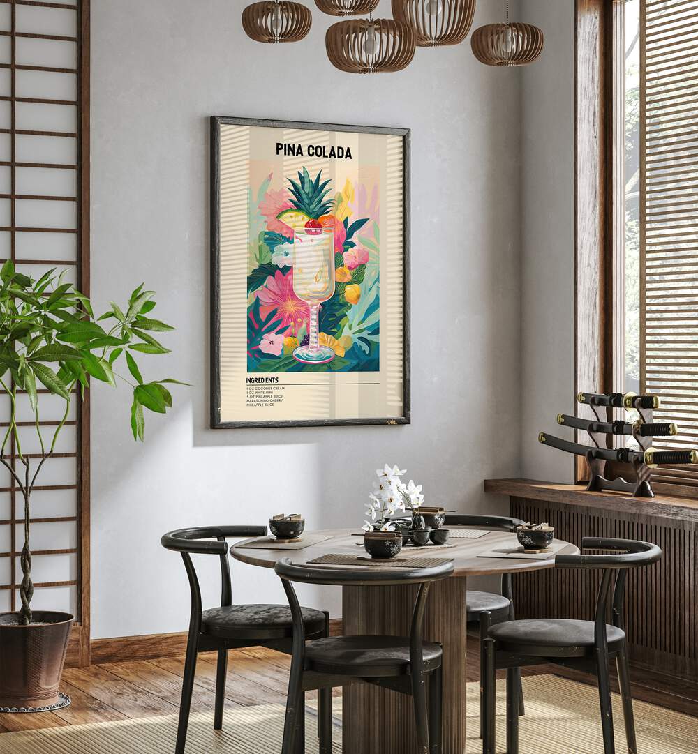 Tropical Pina Colada Cafe Art Prints Cafe Posters in Black Plain Frame placed on a wall in a dining room area beside a window and behind a dining table