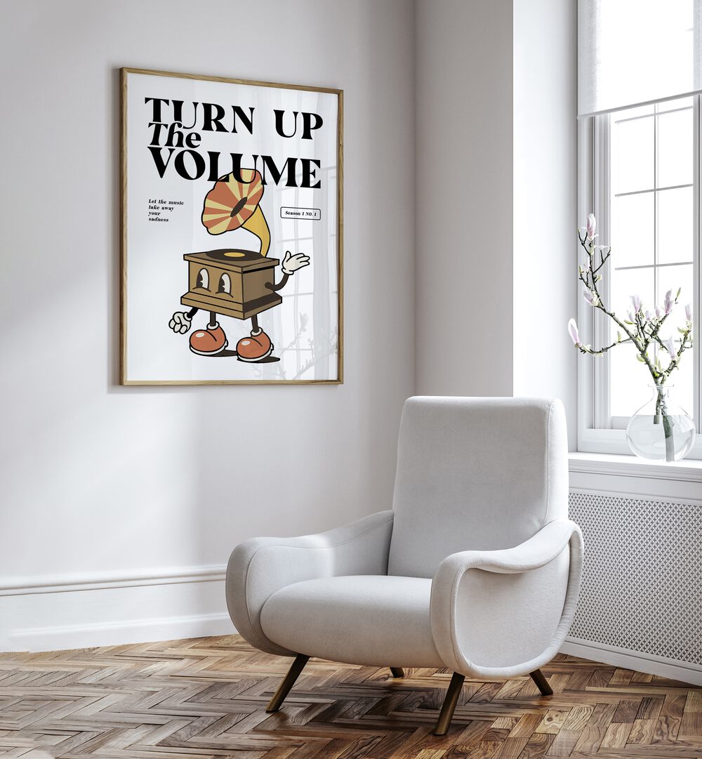 Turn Up the Volume Quotes and Typography Posters in Oak Wood Plain Frame placed on a wall beside a sofa