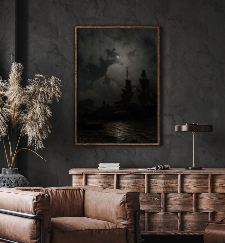 Twilight Voyages Ships Sailing Into The Unknown Gothic Art Prints in Oak Wood Plain Frame hanging on wall above brown chair beside plant.