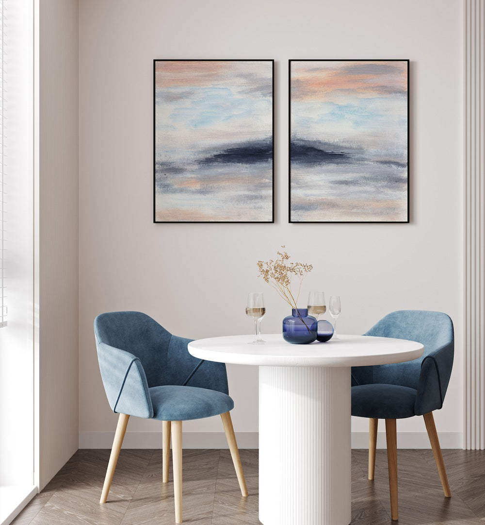 Stylish dining area featuring the TWILIGHT HORIZONS SET, SET OF 2 PAINTINGS, enhancing modern decor beautifully.