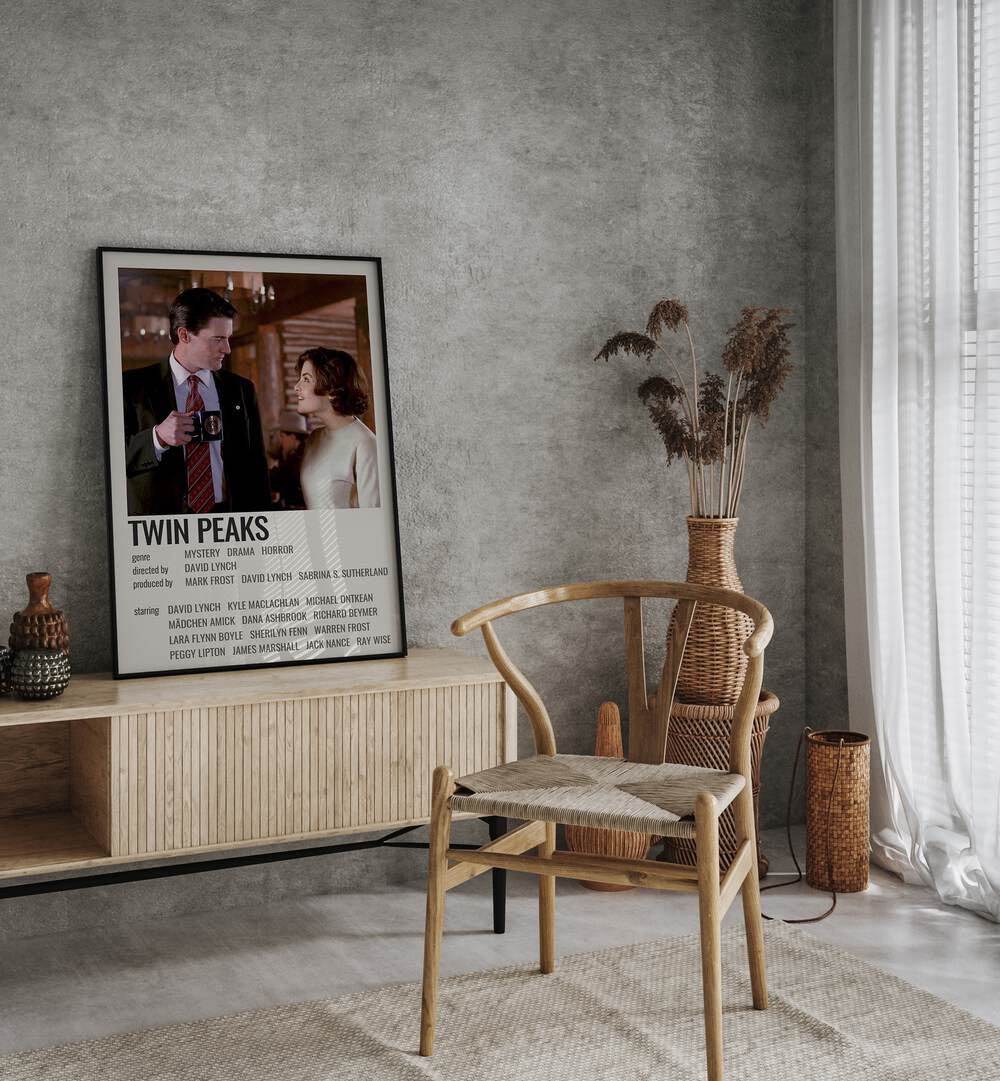 Twin Peaks 1990 Movie Posters in Black Plain Frame placed on a console table behind  a chair