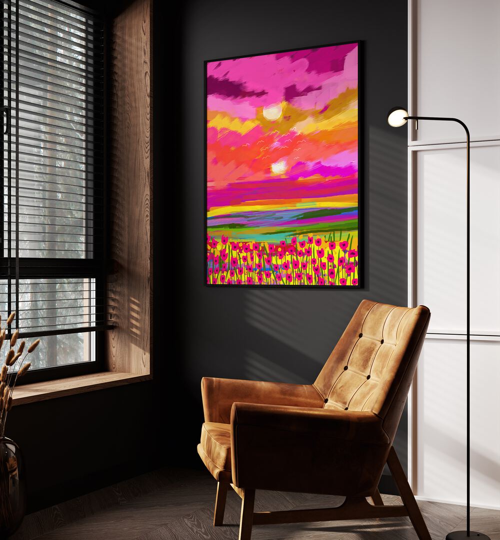 Two Suns By Uma Gokhale Landscape Paintings in Black Plain Frame on a wall beside an orange sofa