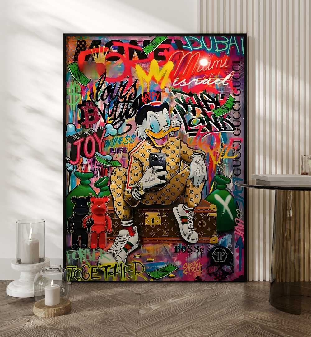 Urban Chick : Gucci Duck Graffiti Comic Art Artwork in Black Plain Frame Placed on a Wooden Floor Leaning on  Wall in the Drawing Room