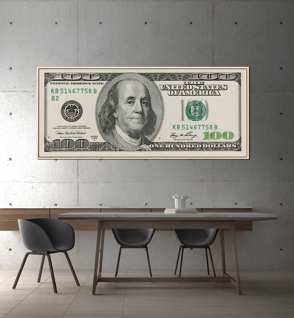 Us Dollar II Money Art Artwork in Oak Wood Floater Frame Placed on a Grey Wall Near a Dining Table 