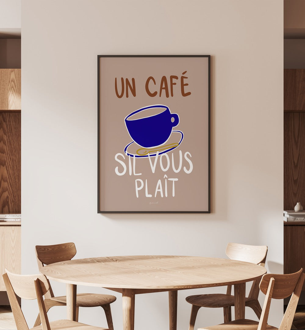 Un Cafe Cafe Art Prints Cafe Posters in Black Plain Frame placed on a Beige Colored Wall near a Dining Table in the Dining Room