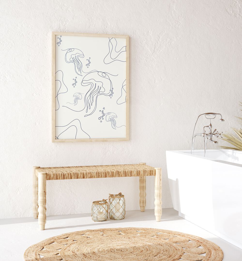 Under Ocean By Grishma Korjani Line Art Prints in Oak Wood Plain Frame placed on a Cream Colored Wall near a Bathtub in the Bathroom