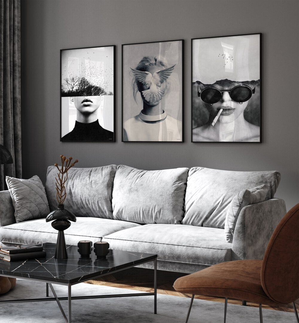 Underdott Artworks Set Set Of 3 Paintings in Black Plain Frame placed on a grey wall behind a grey sofa for living room