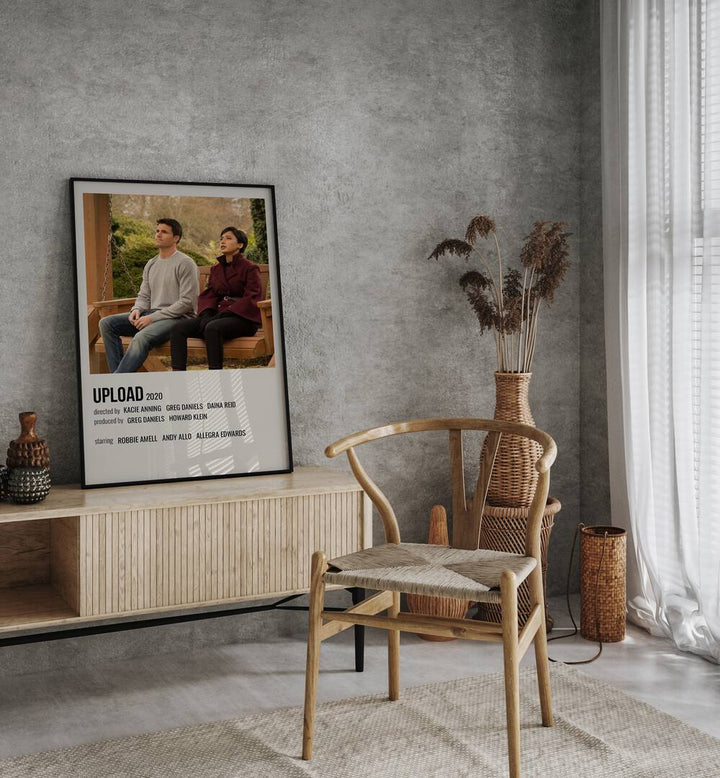 Upload 2020 Movie Posters in Black Plain Frame on a console table behind a chair