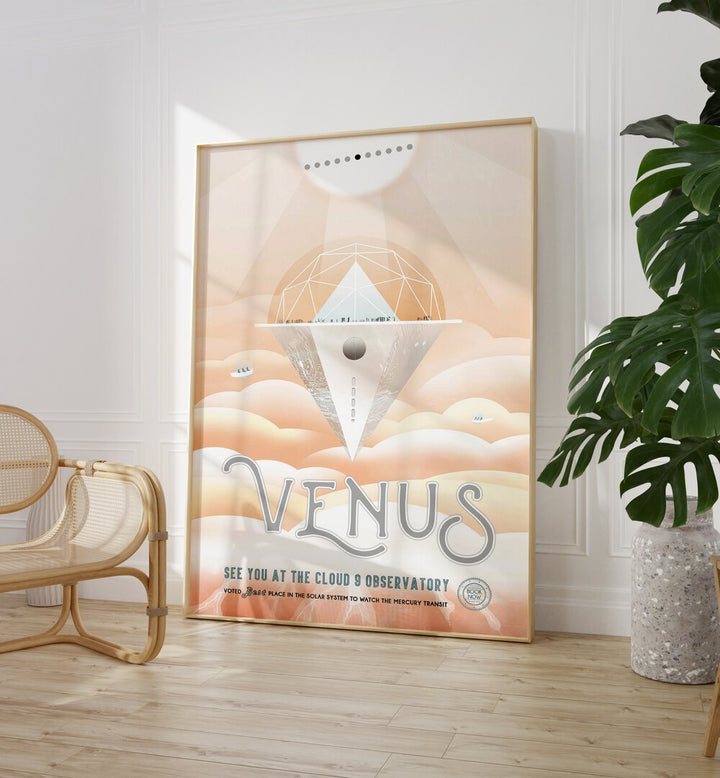 Venus Astronaut & Nasa Paintings, Space Art Prints Artwork in Oak Wood Plain Frame placed on a Wooden Floor near a White Colored Wall


