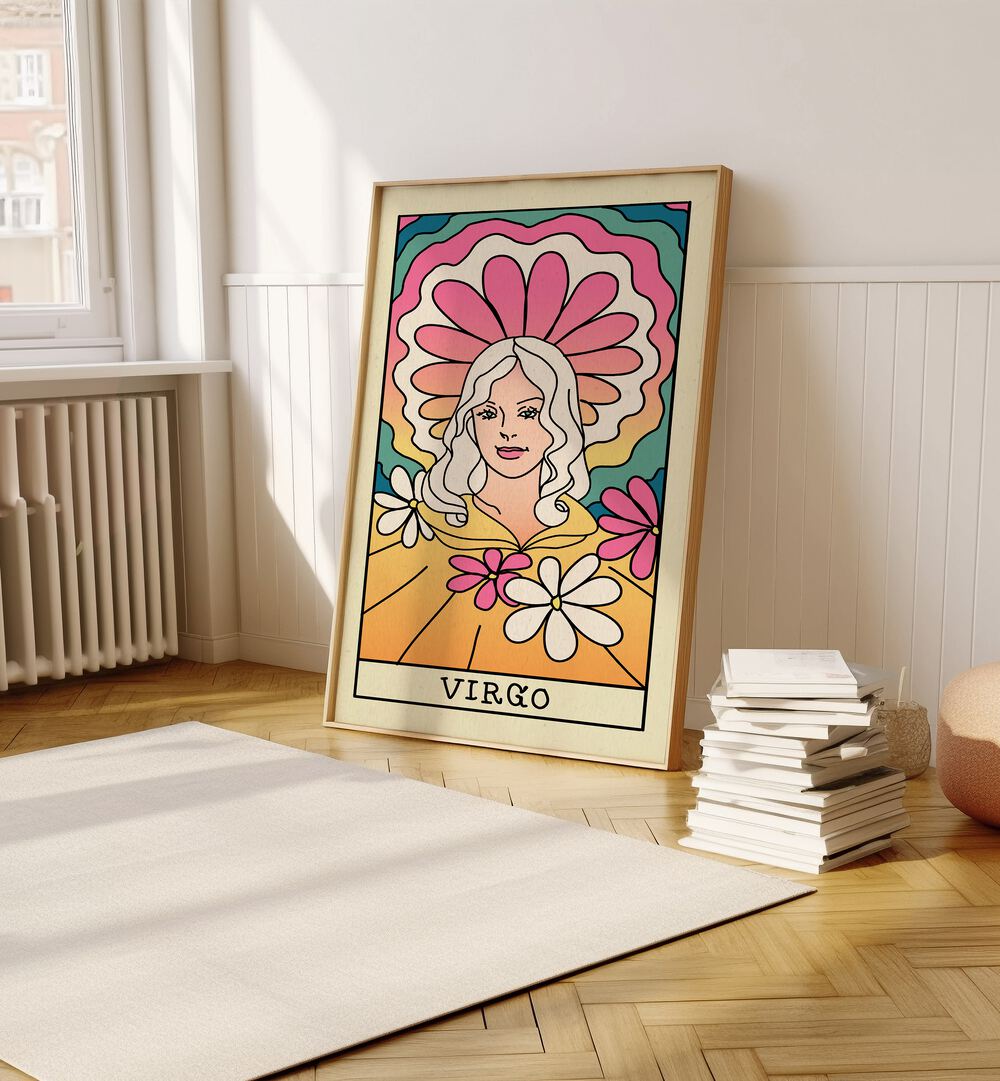 Virgo Zodiac & Tarot Art Painting Artwork in plain oakwood frame on a wooden floor beside a stack of books