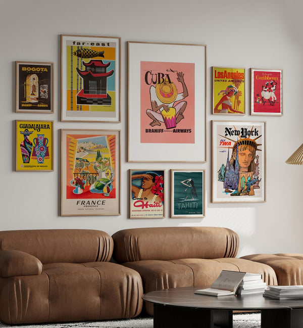 Stunning VINTAGE TRAVEL ART GALLERY WALL displaying colorful travel posters, perfect for stylish GALLERY WALLS decor.