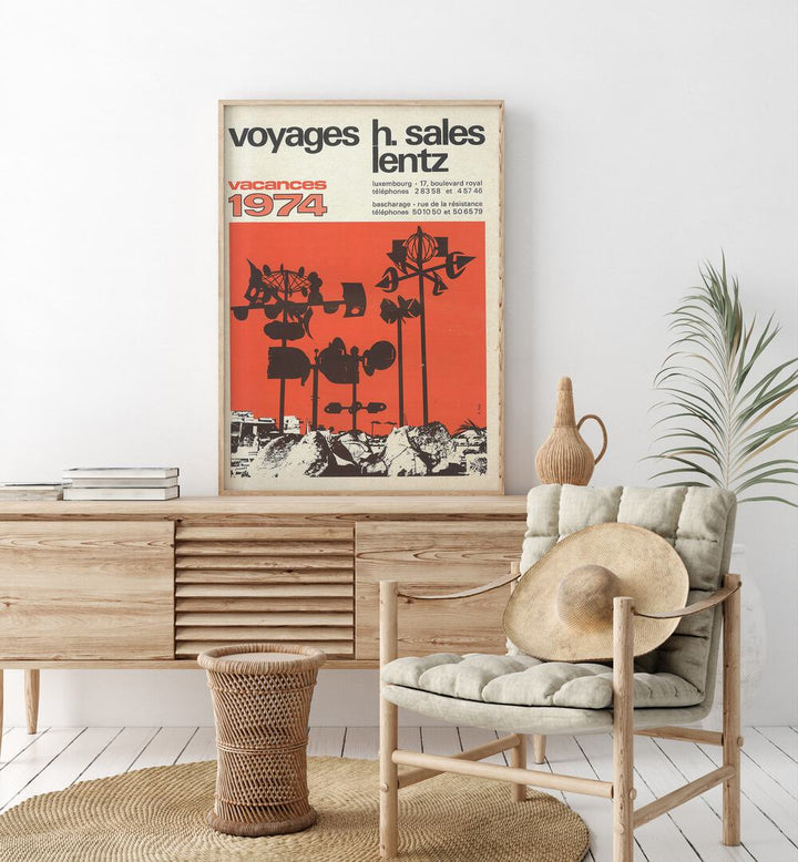 Vacances-1974 Retro Vintage Travel Travel Posters in Oak Wood Plain Frame on a console table beside a plant