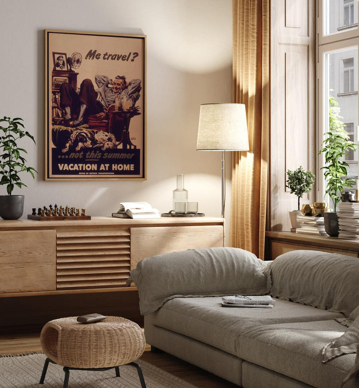 Vacation at Home  Retro Travel Posters in Oak Wood Plain Frame placed on a wall behind a console table