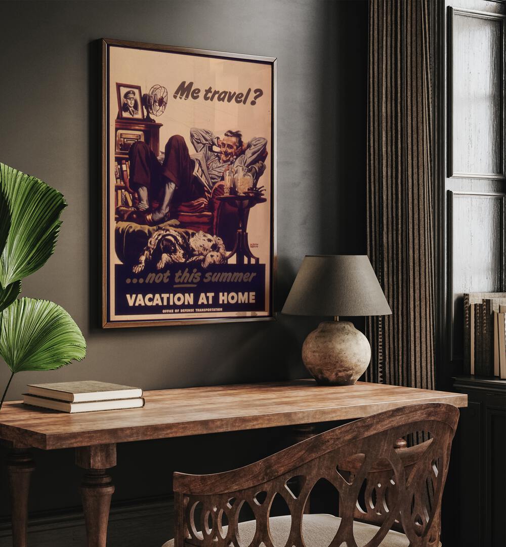 Vacation at Home  Retro Travel Posters in Dark Wood Plain Frame placed on a wall behind a study table