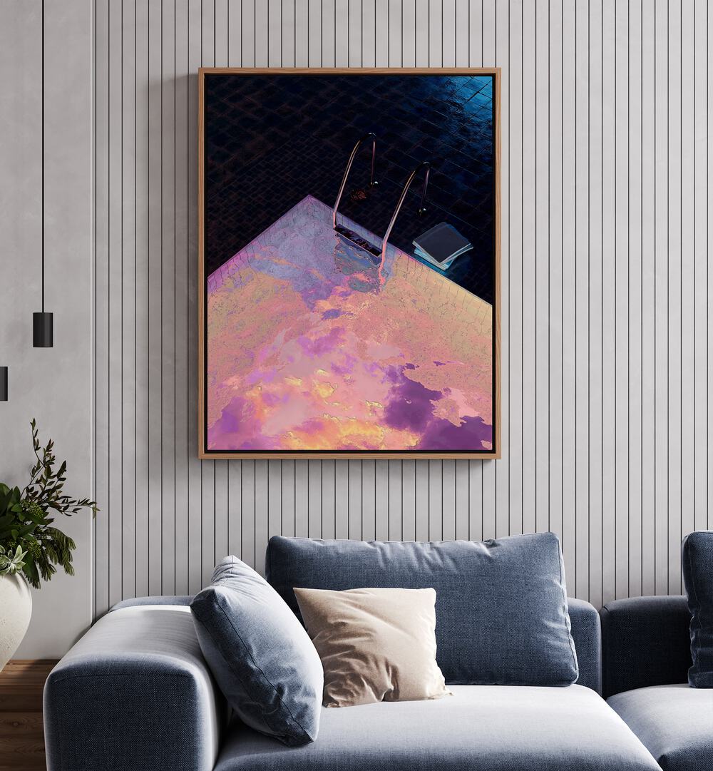 Vapor Pool I By Cosmo Zach Surreal Art Prints Surrealism in Oak Wood Floater Frame placed on a wall behind a sofa