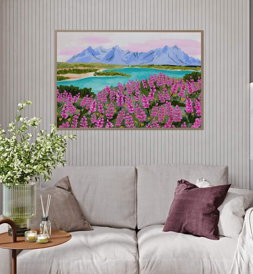 Vestrahorn By Sarah Gesek Landscape Art Prints in Oak Wood Plain Frame placed on a wall behind a sofa for living room